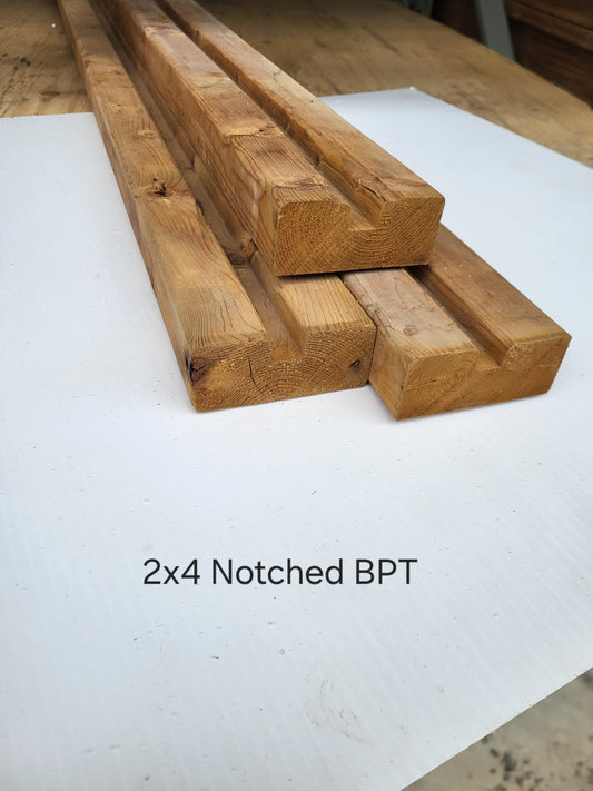 2X4X8 BROWN PT NOTCHED FOR LATT